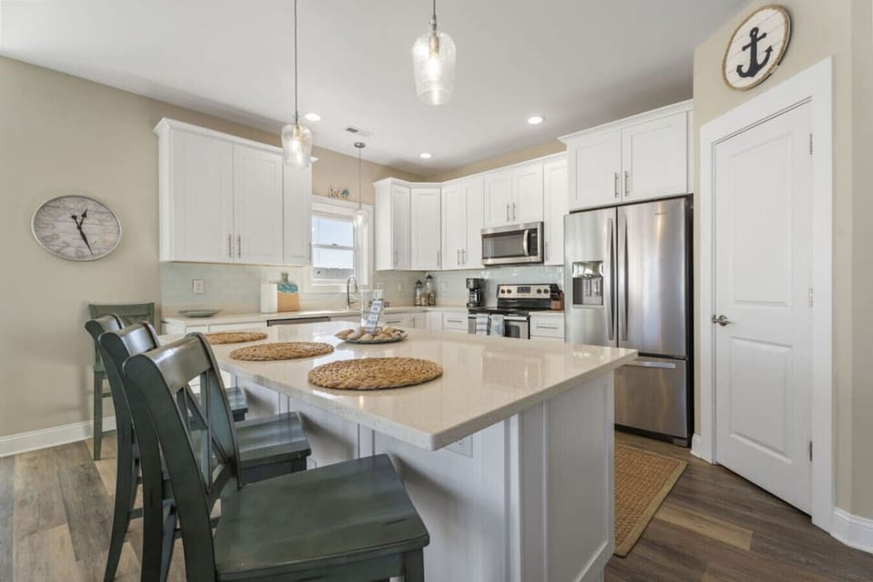 Large, open kitchen with bar seating