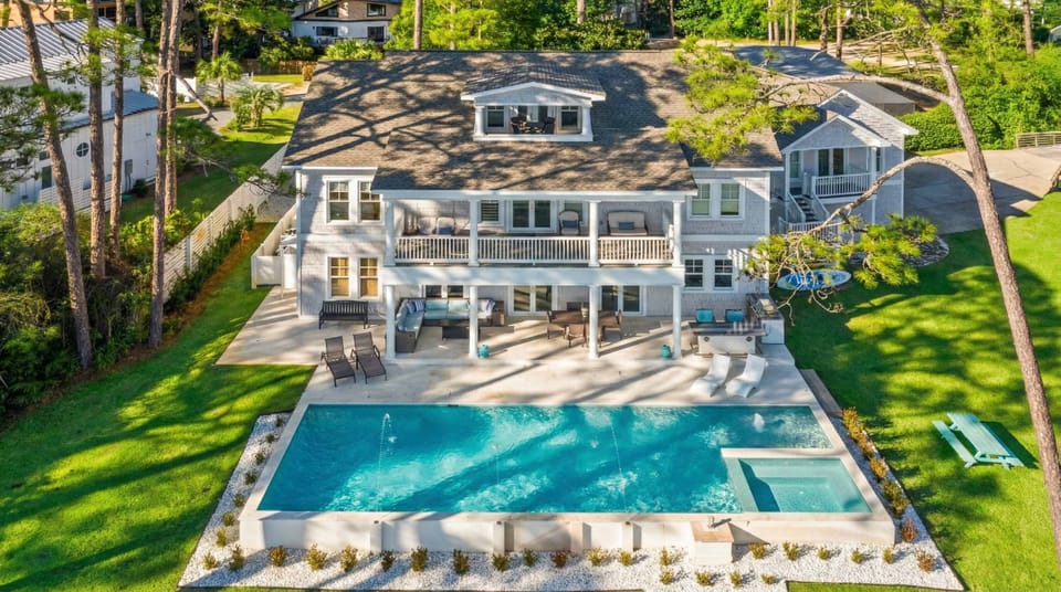 Aerial view of the pool, hot tub, and decks.