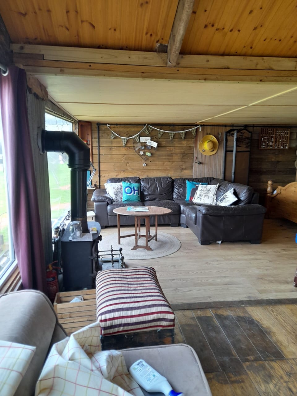large leather sofa by picture window
