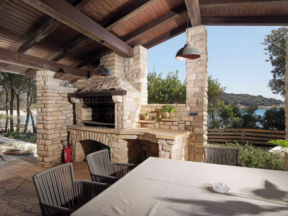 Wood, Furniture, Chair, Outdoor Furniture, Shade, Flagstone, Brick, Porch, Column, Patio