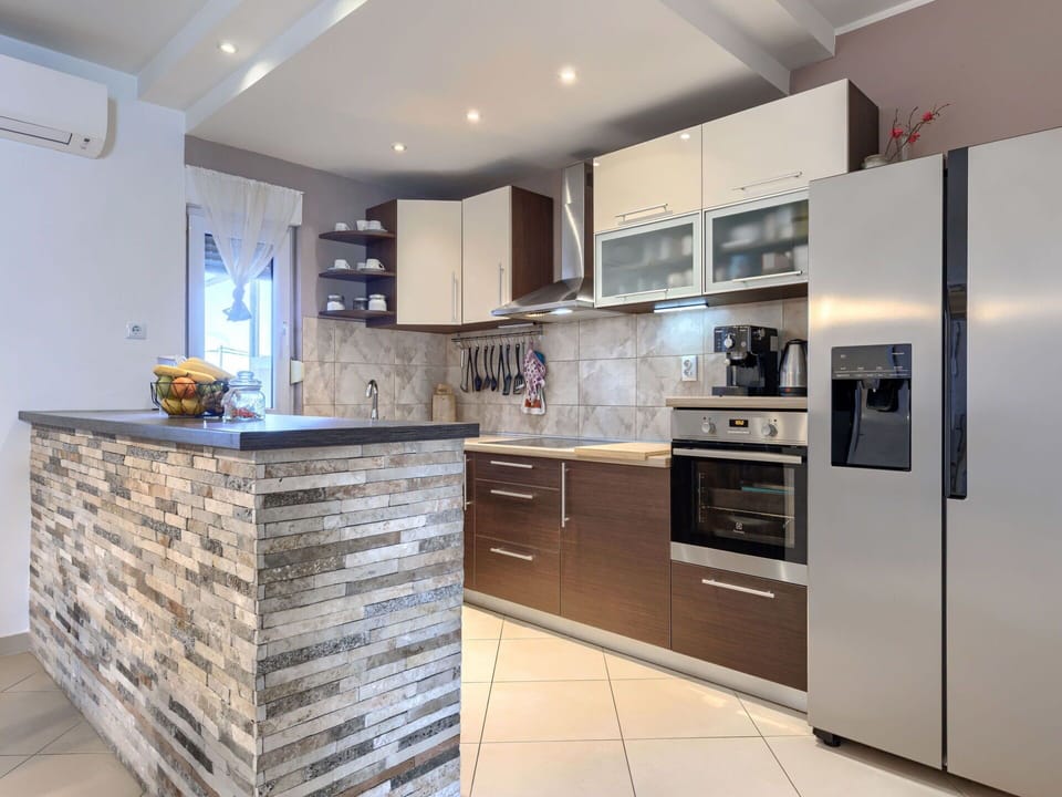 Furniture, Countertop, Flooring, Interior Design, Kitchen, Wood, Cabinetry, Floor, Home, Kitchen Appliance
