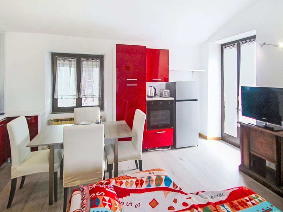 Furniture, Interior Design, Flooring, Floor, Wood, Room, Ceiling, Apartment, Home, Chair