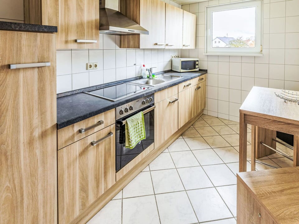 Wood, Kitchen, Flooring, Major Appliance, Interior Design, Countertop, Floor, Cabinetry, Sink, Plumbing Fixture