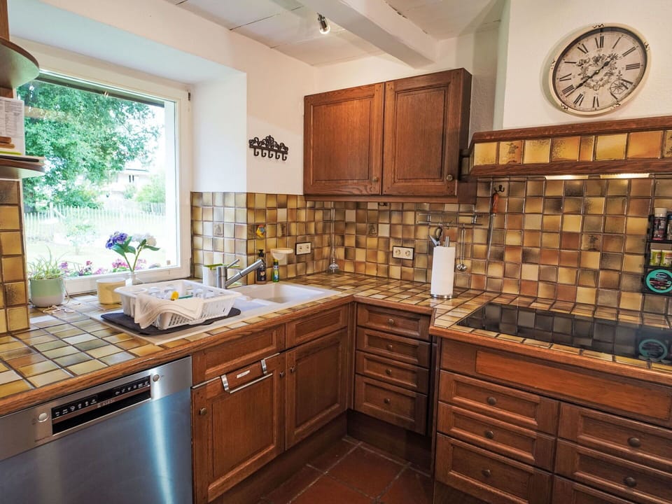 Kitchen, Countertop, Cabinetry, Flooring, Wood, Interior Design, Kitchen Appliance, Floor, Drawer, Tile