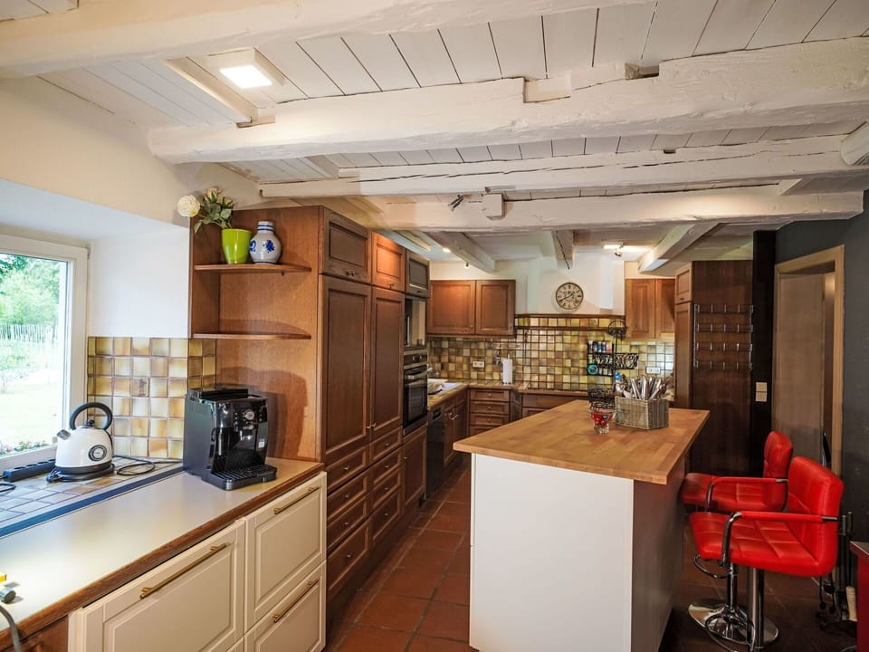 Furniture, Kitchen, Countertop, Cabinetry, Flooring, Interior Design, Floor, Wood, Kitchen Appliance, Ceiling