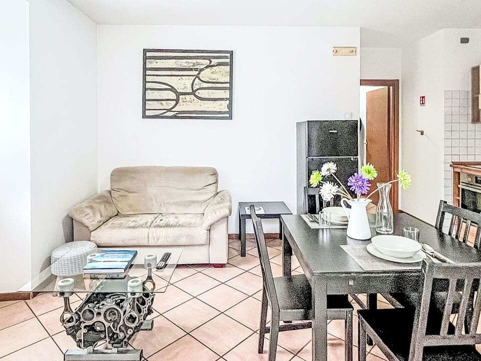 Furniture, Interior Design, Flooring, Floor, Room, Couch, Ceiling, Apartment, Living Room, Table