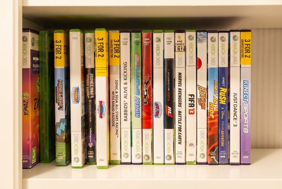 Browse the shelf of boxed Xbox titles for family favourites.