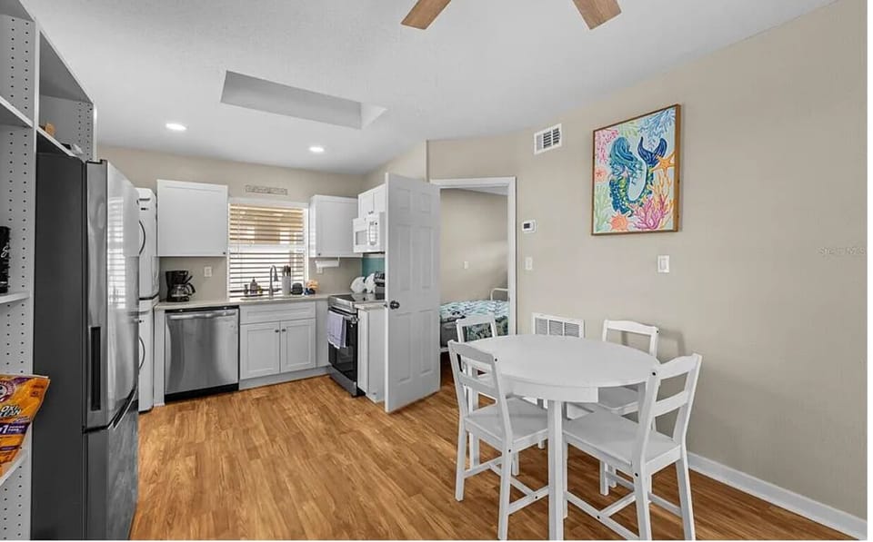 Kitchen with table to enjoy meals before exploring IRB!