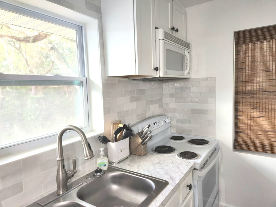 Full Kitchen: Refrigerator and Stove/Oven. Built in Microwave