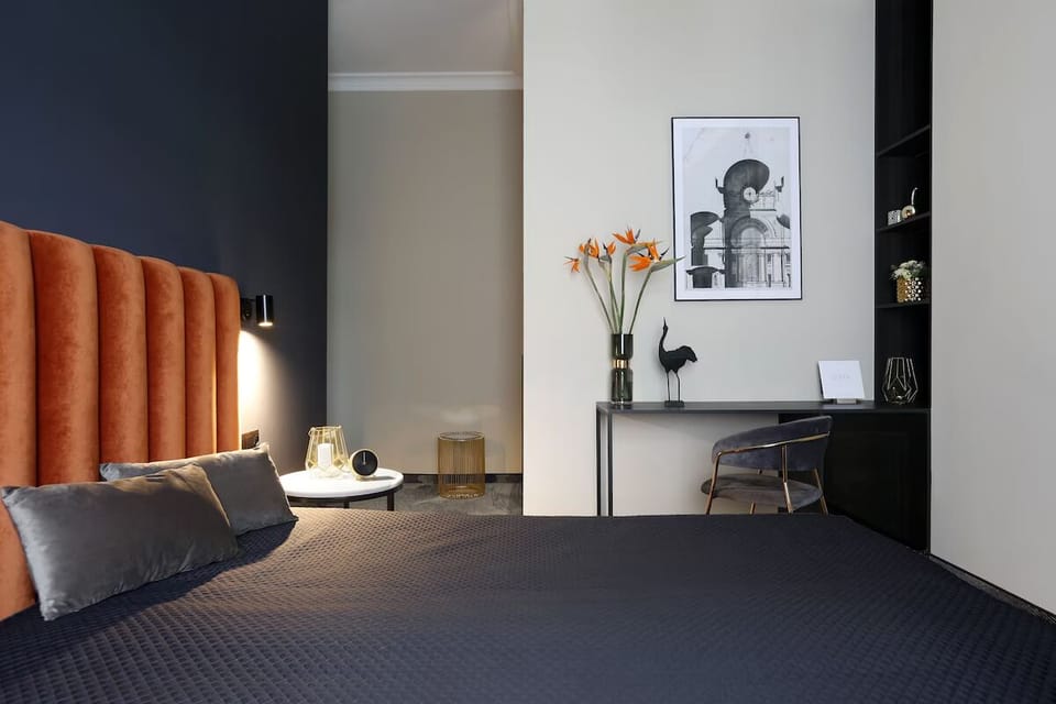 Recharge beside plush linens and a calm, modern workspace.