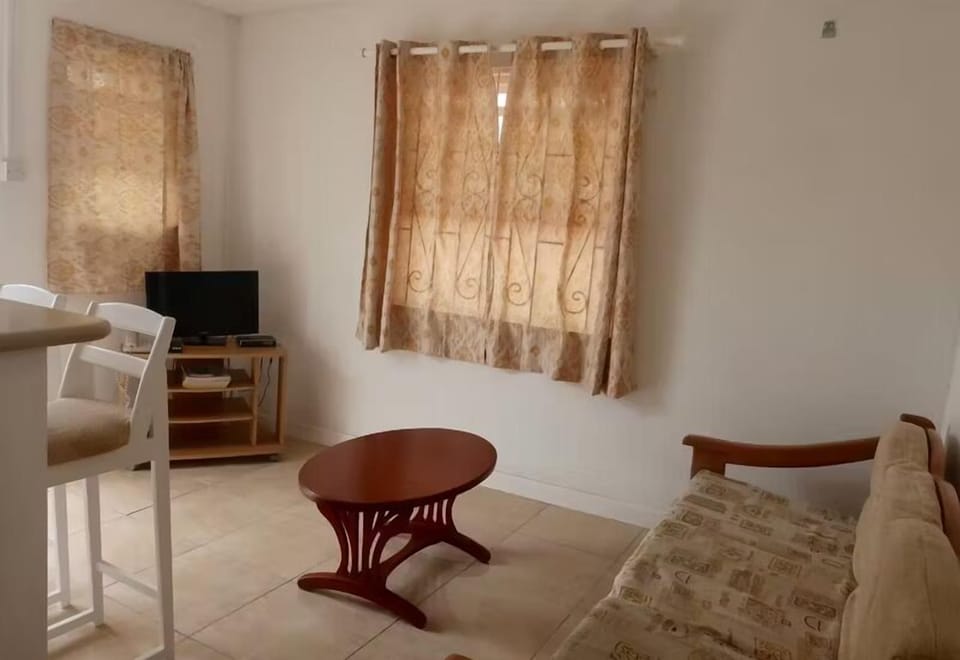 Kick back with a movie in the simple, airy lounge.