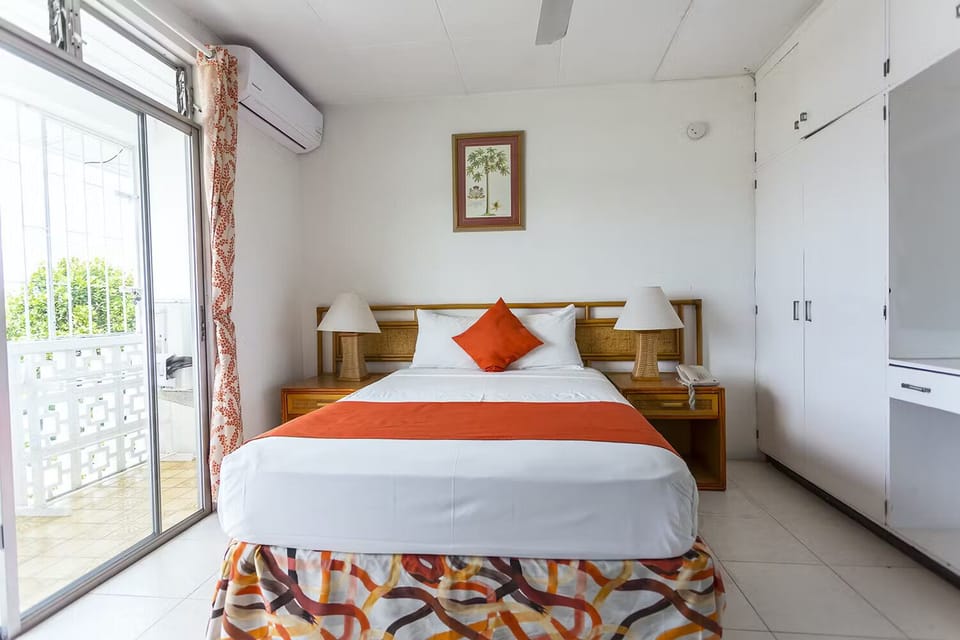 Settle into crisp linens with generous closets for easy stays.