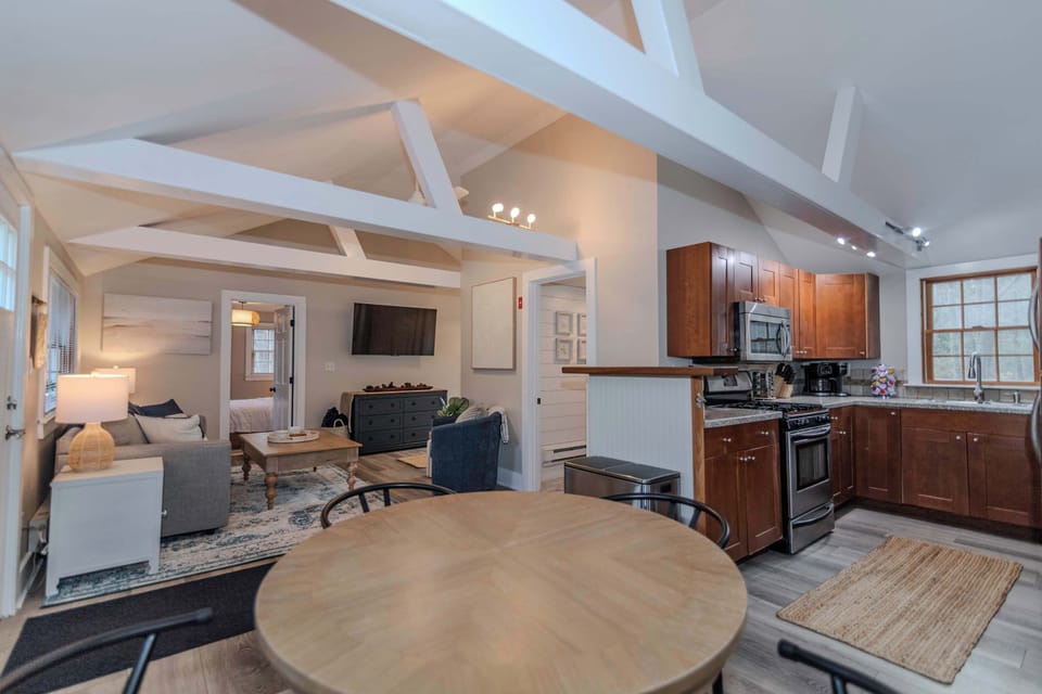 Open concept living room, dining room, and kitchen