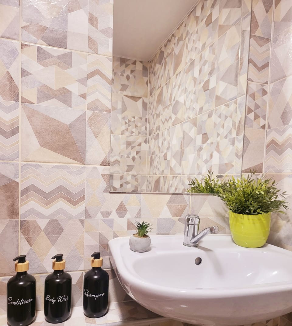 For your comfort, the bathroom is stocked with shampoo, body, wash, conditioner