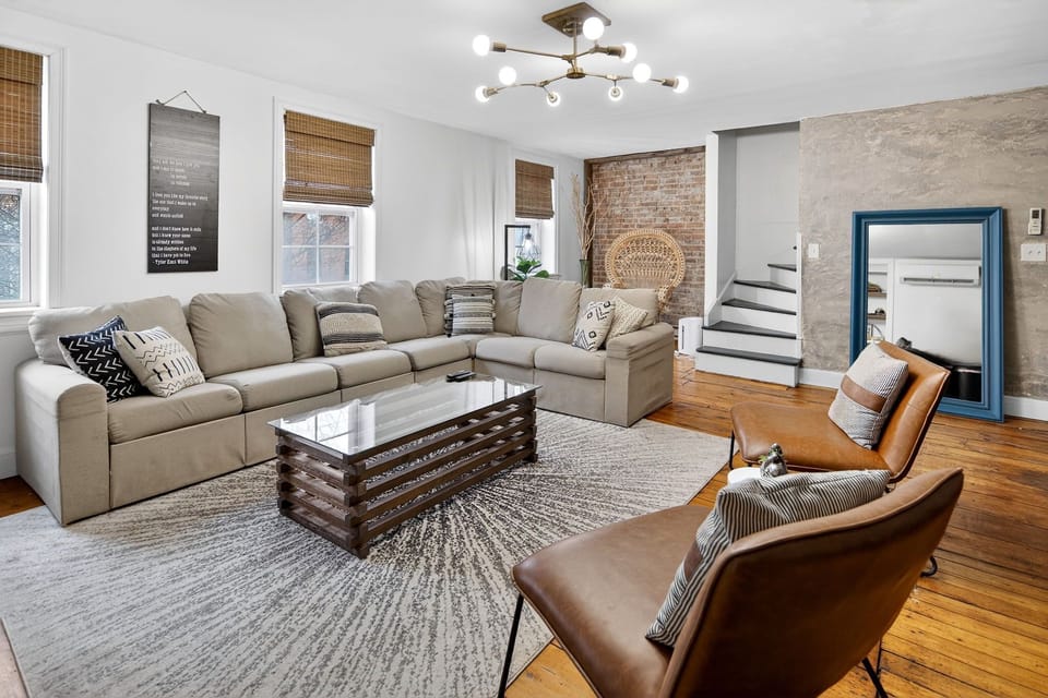 Historic brick, hardwood floors, and modern lighting—classic Troy charm.