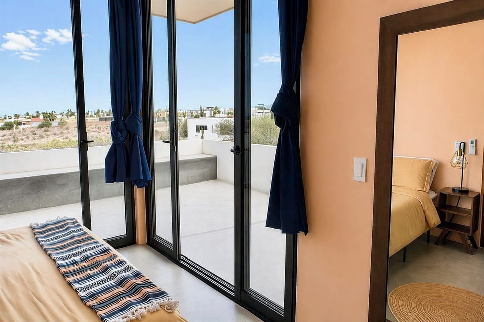 Upstairs bedroom with king bed | Air conditioning | Ceiling fan | Clothing storage | Hangers
