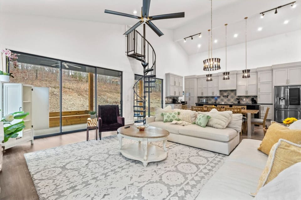Main living room, kitchen and dining area for up to 8 guests to gather.