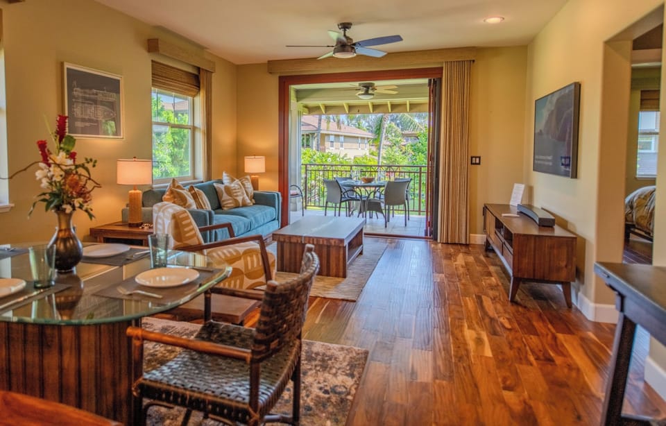 Linger outside with relaxed patio seating under swaying palms.