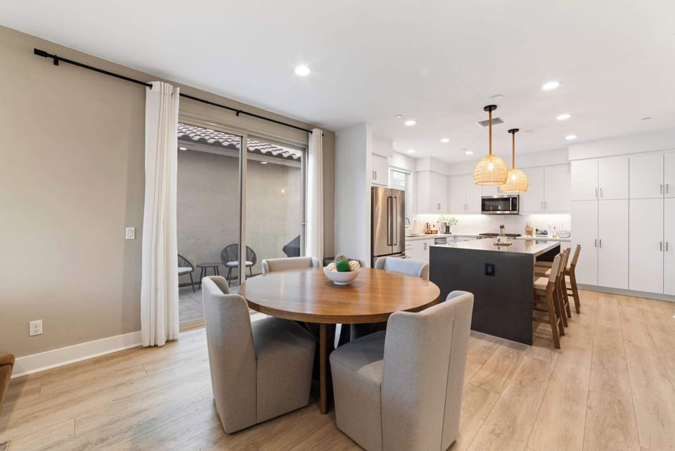 Dining area with seating for meals, games, or working remotely