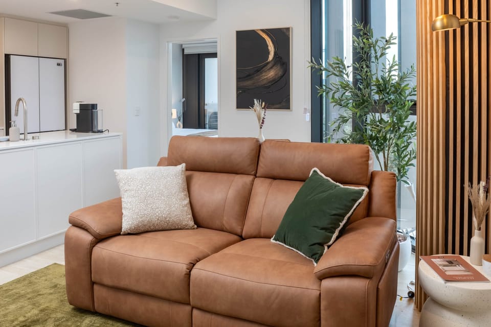 The plush recliner sofa offers exceptional comfort, perfect for relaxing, reading, or movie nights.