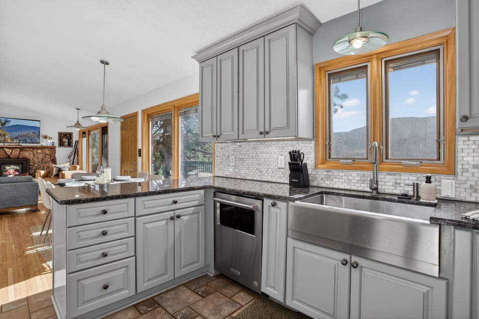Open kitchen area with high end  full size appliances