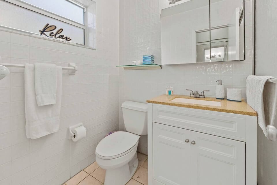 Perfectly sized bathroom to wash all that sand off. 
