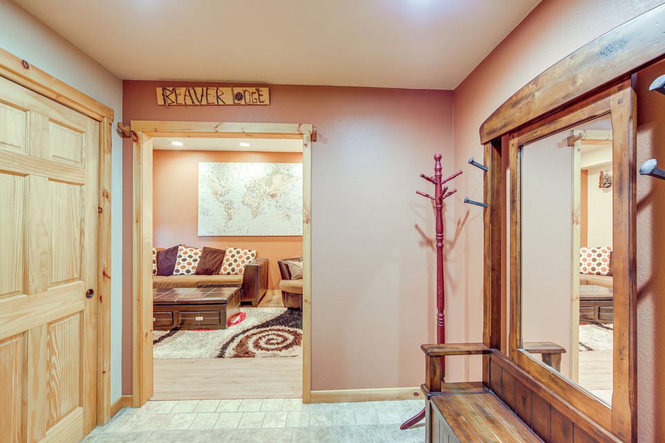 Step into your cozy mountain retreat where warm wood and rustic charm welcome you home after adventurous days.