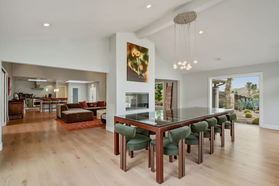 Large dining table with seating for up to 12 guests.