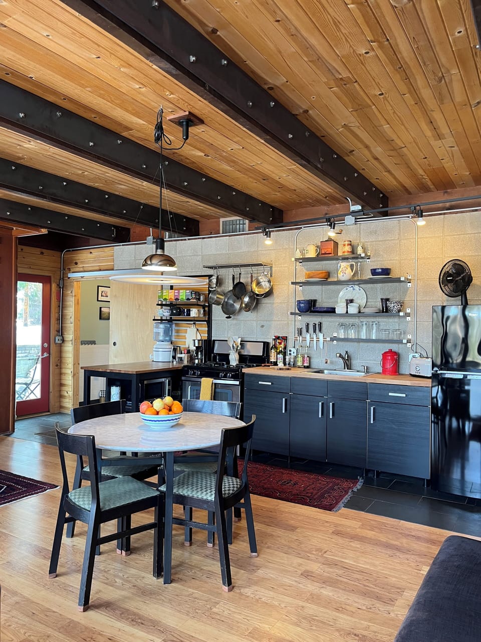 Dining table and Kitchen.