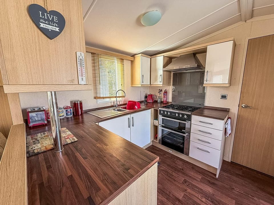 Bright and modern kitchen is perfect for preparing a full breakfast for the whole family before heading out to explore the coastline of Essex.