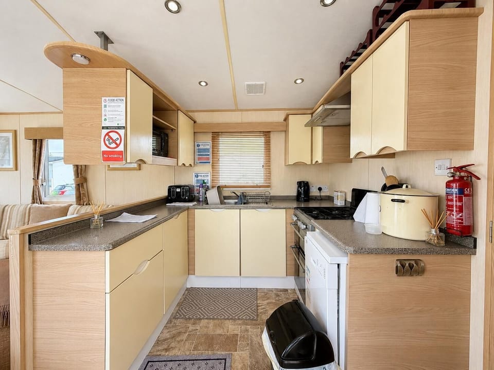 The bright modern open plan lounge is perfect for sitting back and exchanging stories with the family about your day. Get planning for the next adventure.