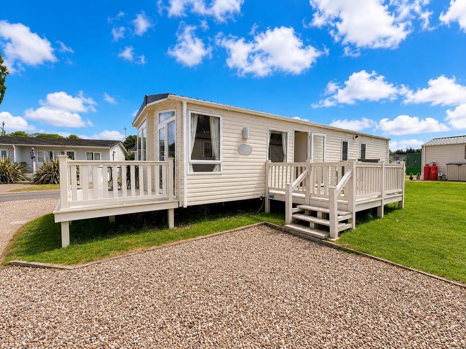 Private wraparound decking at this 3-bedroom holiday home at Broadland Marina Holiday Park, providing the perfect outdoor space for relaxing and al fresco dining.