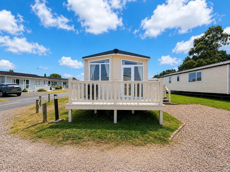 Enjoy outdoor living with spacious decking at this 6-berth holiday caravan on the beautiful Broadland Marina Holiday Park.