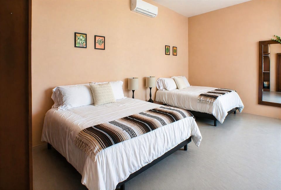 2 queen beds | Air conditioning | Ceiling fan | Clothing storage | Hangers
