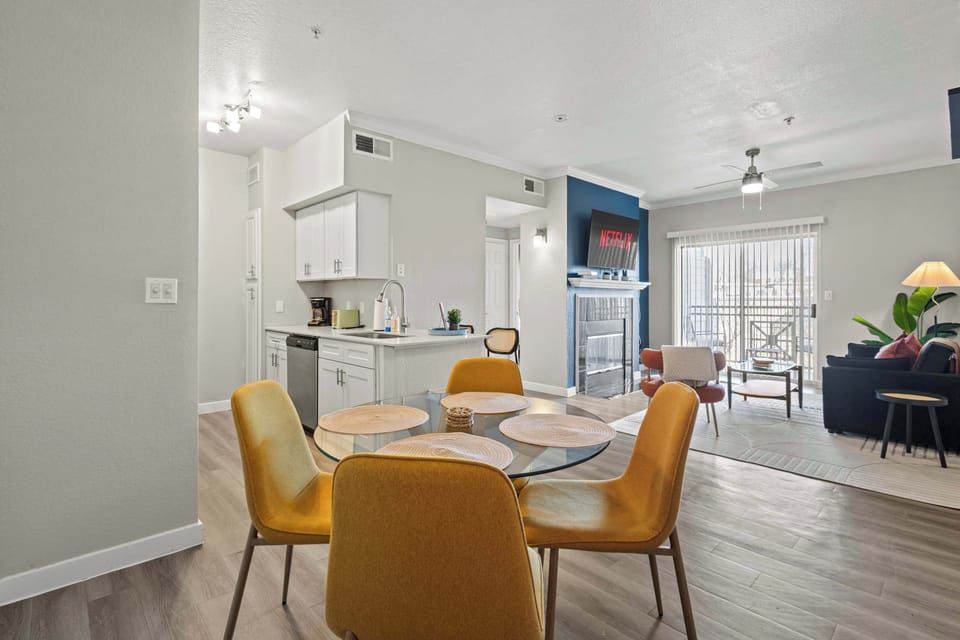 Spacious open layout combining dining and living areas for easy flow and comfort. Natural light, clean finishes, and modern furnishings make this space ideal for relaxing, socializing, or enjoying extended stays.