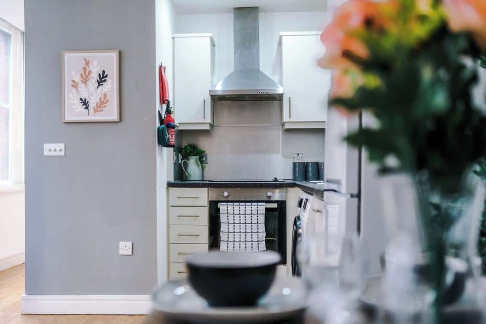 Kitchen: Modern appliances and stylish decor, perfect for culinary adventures!