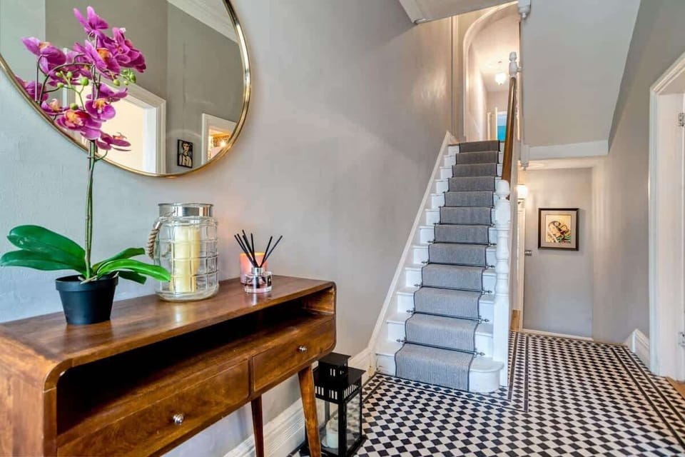 Bathroom Bliss: Enjoy sleek fixtures and natural light in this chic, refreshing retreat!