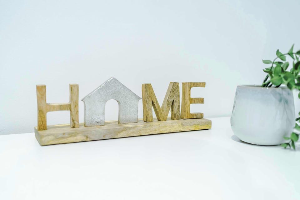 Welcoming Decor: Embrace a stylish vibe with charming accents that say, "Welcome Home!"