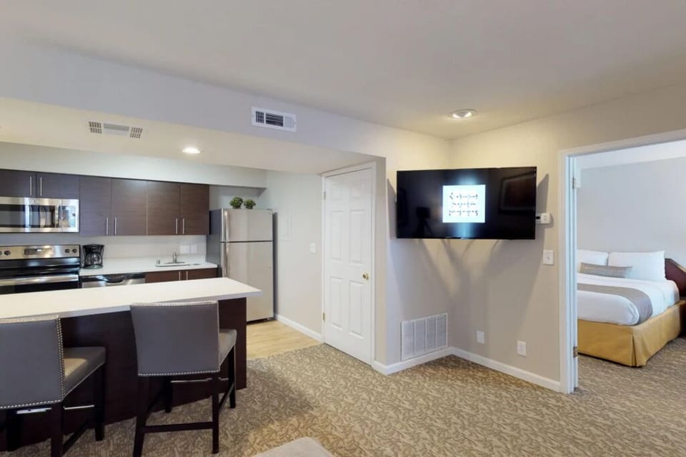 Settle in for movie nights in this open-plan suite.