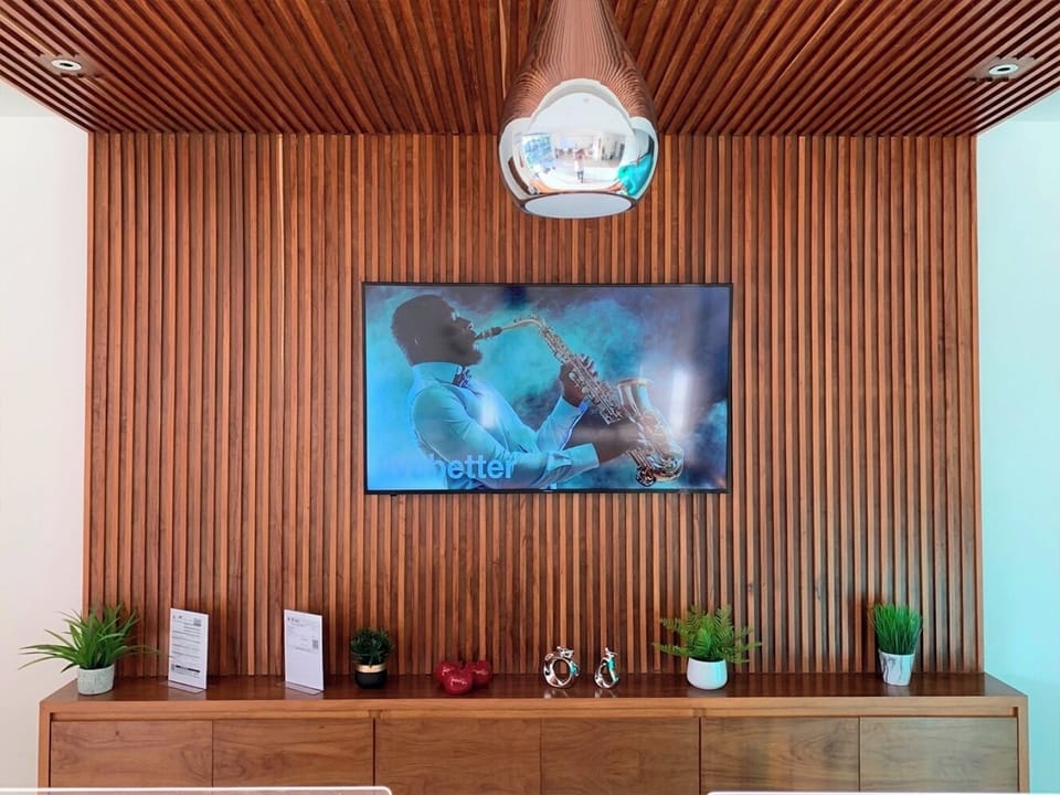 Unwind in a stylish lobby with warm, modern finishes.