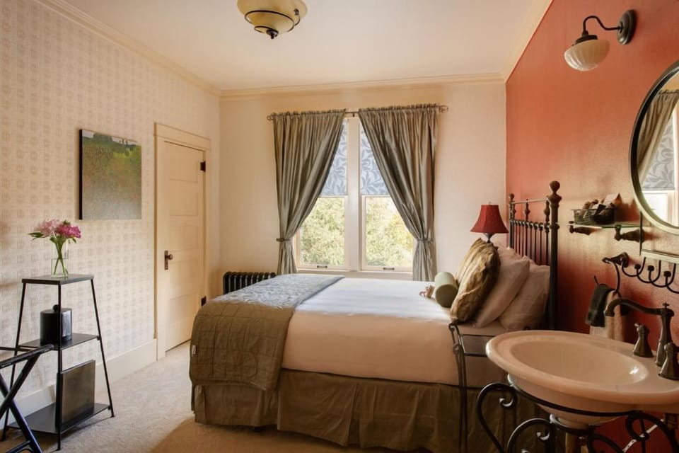 Wake up to natural light in this charming, spacious room.