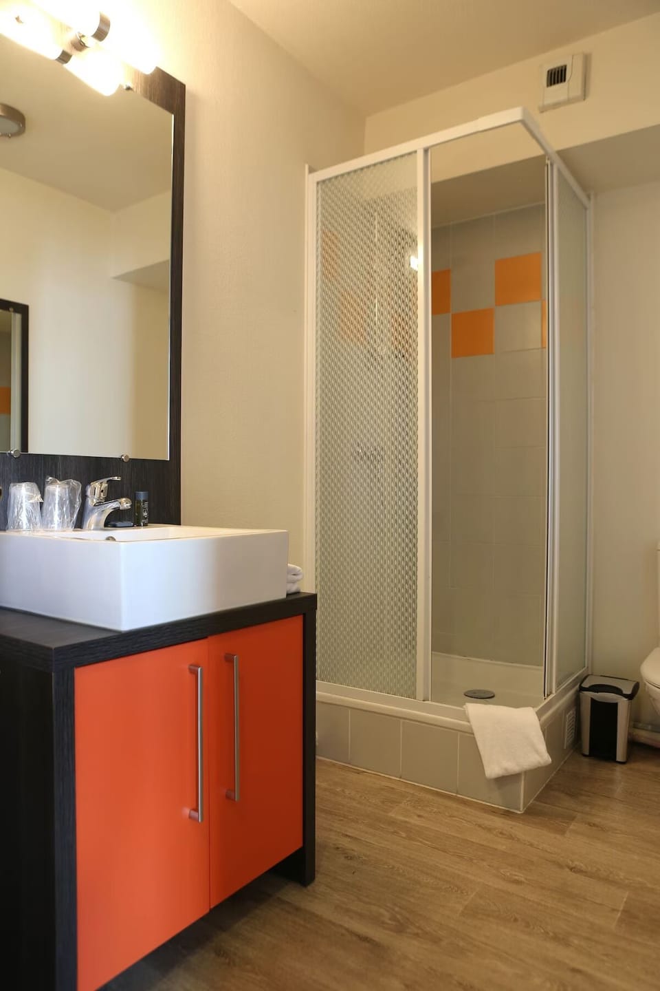 Refresh after exploring in a clean, spacious shower suite.