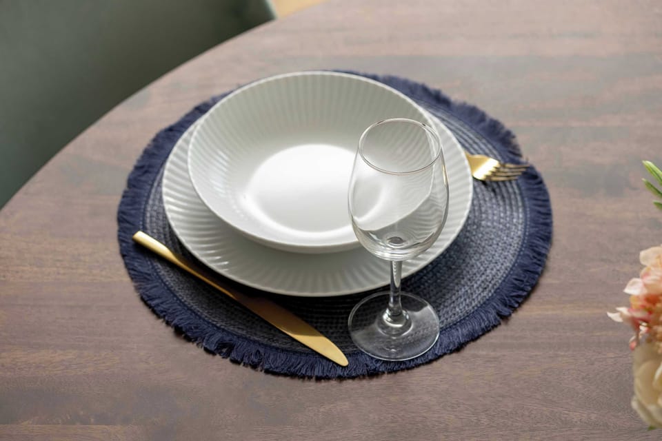 Close-up of tableware placed on the table.