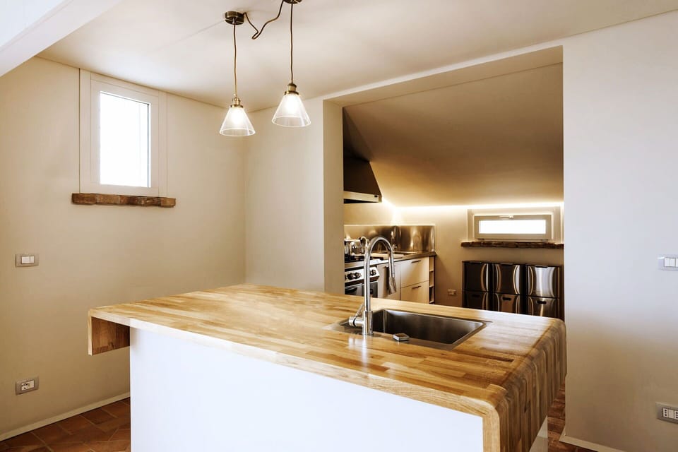 Interior Design, Countertop, Wall, Flooring, Wood, Furniture, Ceiling, Kitchen, Light Fixture, Cabinetry