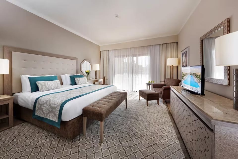 Relax in a bright, airy room with plush seating.