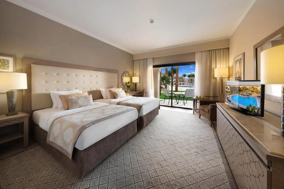 Sink into crisp linens in a bright, airy two-bed room.