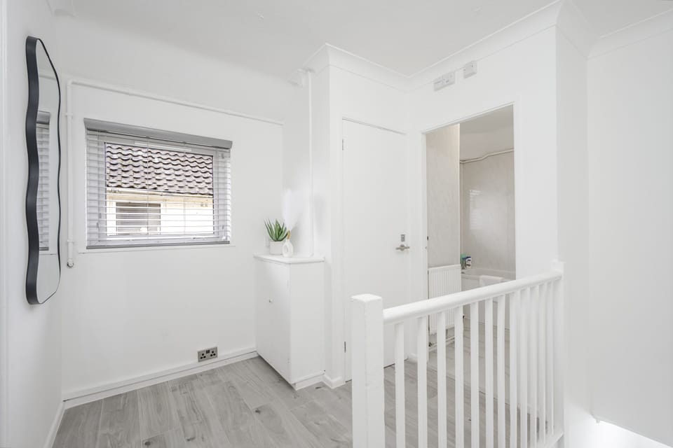 Hallway Leading to Toilet and Bathroom