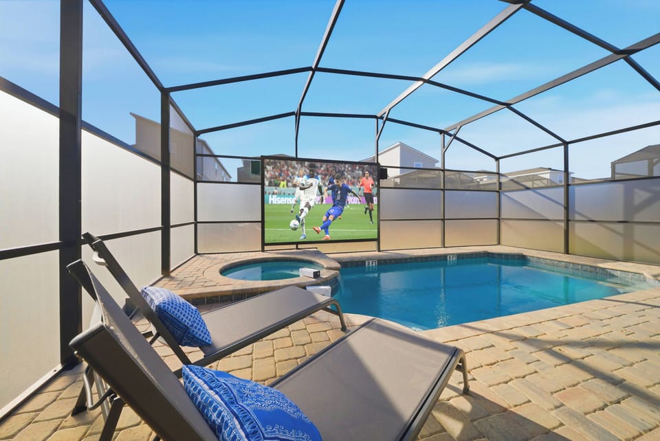 Relax by the shimmering pool, framed by sleek screens for uninterrupted views. Enjoy sunny days lounging on modern chaise lounges, while the outdoor TV sets the stage for fun evenings under the open sky.