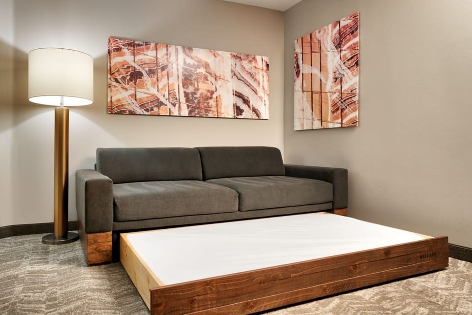 Kick back on the sofa, then fold down extra sleeping space.
