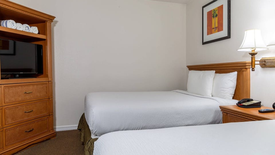 Unwind in crisp linens and cozy twin beds nightly.